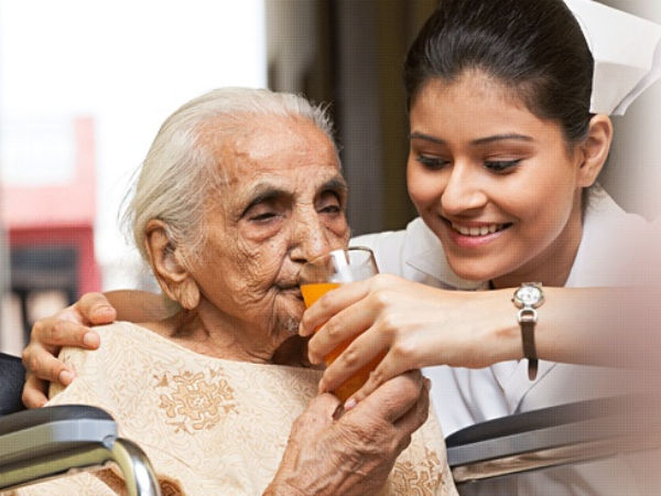 A nurse helping an old age woman