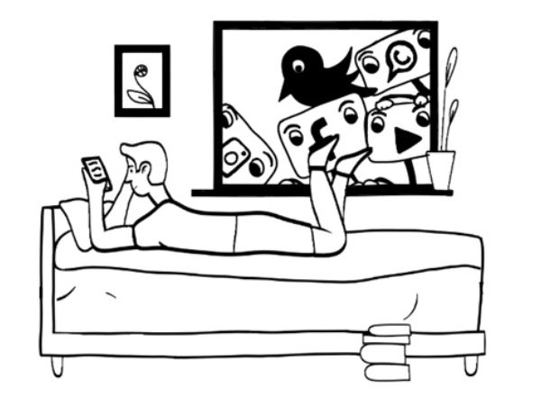 A boy laying on the bed and watching phone