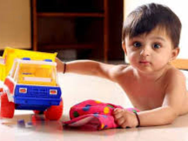 A child is playing with a toys
