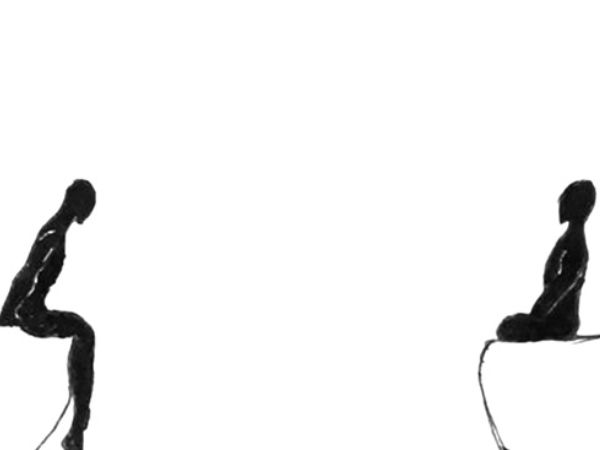two people siting face to face
