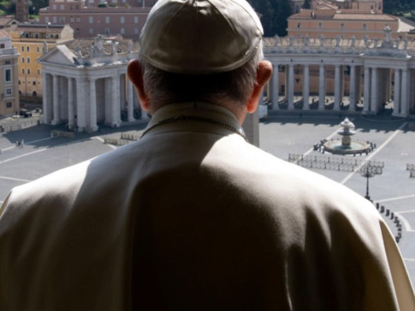 pope francis looking from st, peter's square