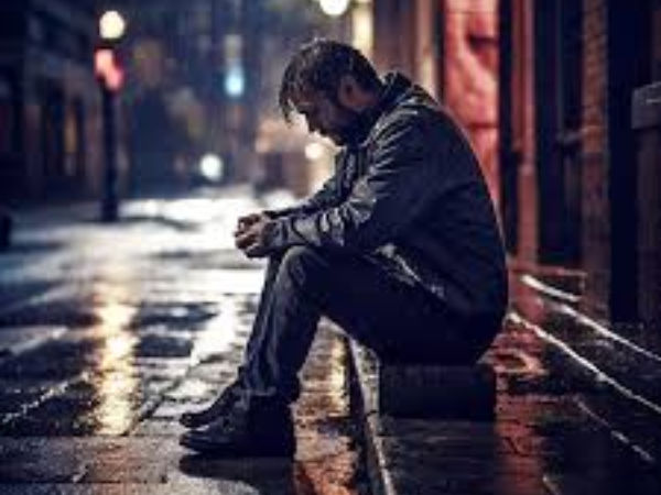 A man is sitting alone