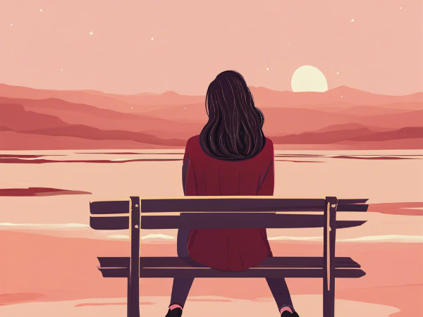 a girl looking into the sunset because of loneliness