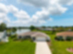 Aerial view of a suburban home for a real estate photography portfolio.