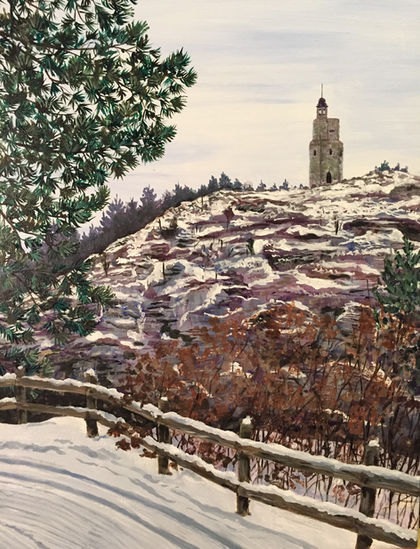 A groomed snowy trail with wooden rails overlooks a rocky mountain with a tower on top. A green tree is visible nearby.