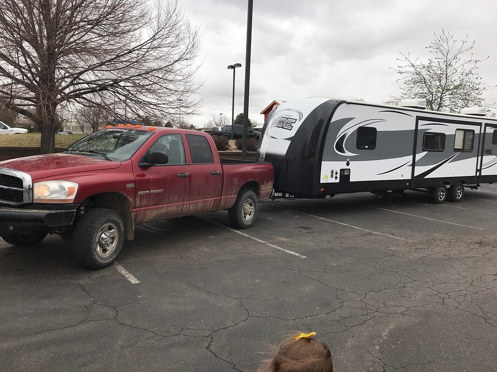 Our truck pulling our camper