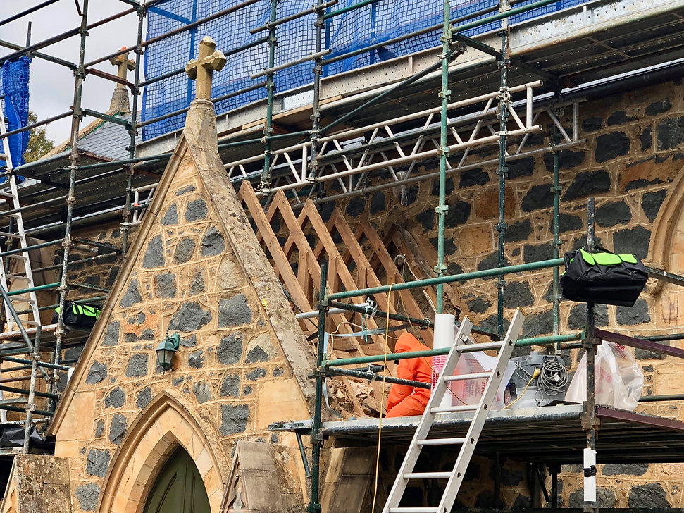 Asbestos curch tiles being removed