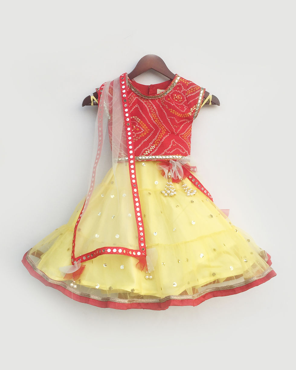 Red Choli with Yellow Boti net Lehenga and Dupatta