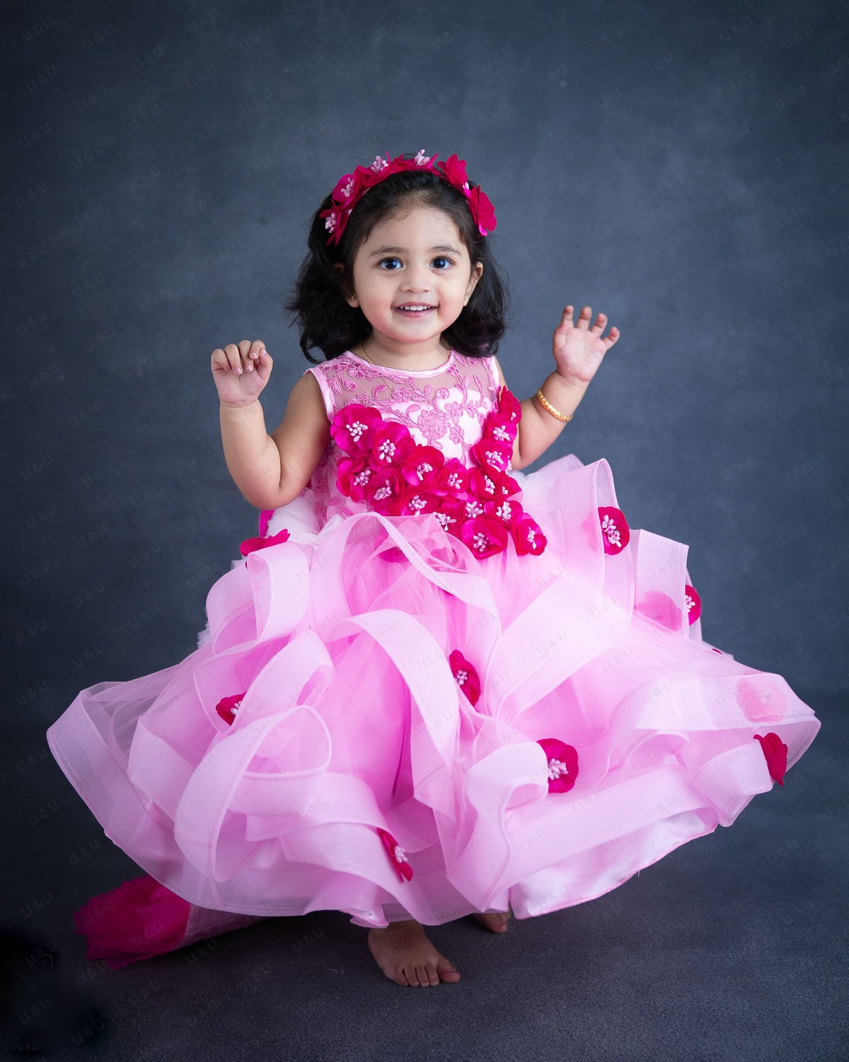 Baby Pink Twirl Flouncy Gown With Frilled Layered Trail 