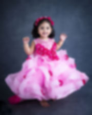 Baby Pink Twirl Flouncy Gown With Frilled Layered Trail 