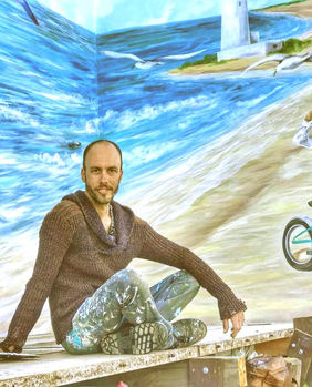 Street Art. Sacred Geometry. Muralism. Street art artist. Muralist. Birds mural painting. Wings painting. Flower of Life mural.