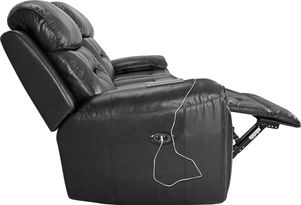 Black leather recliner with extended footrest and a charging cable solferinoweb