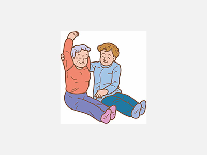 手を挙げてリハビリする人