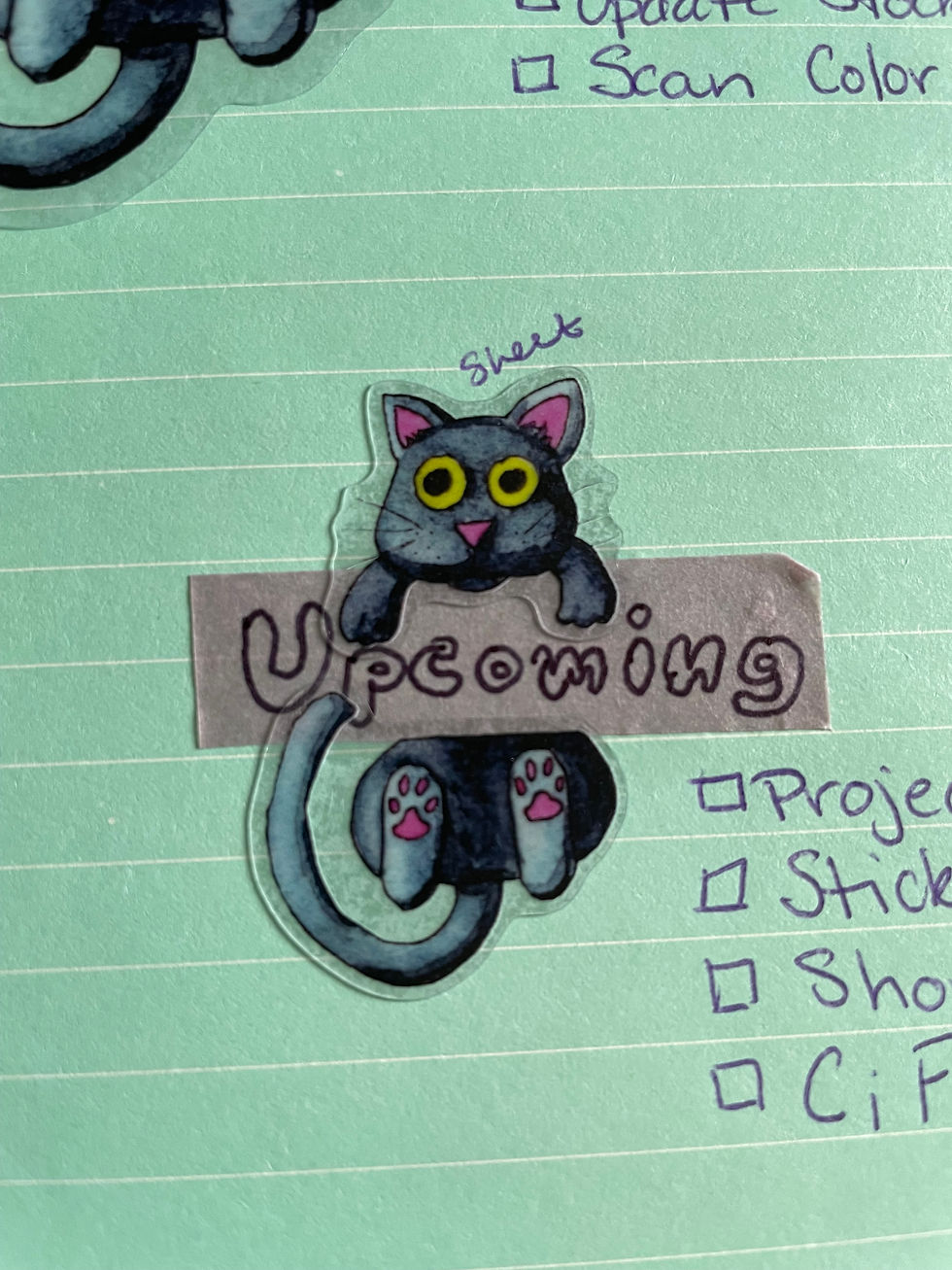 Thumbnail: A green sheet of paper with a purple piece of tape reading "upcoming" with a sticker of a black cat placed to make it look like the cat is hanging behind the tape