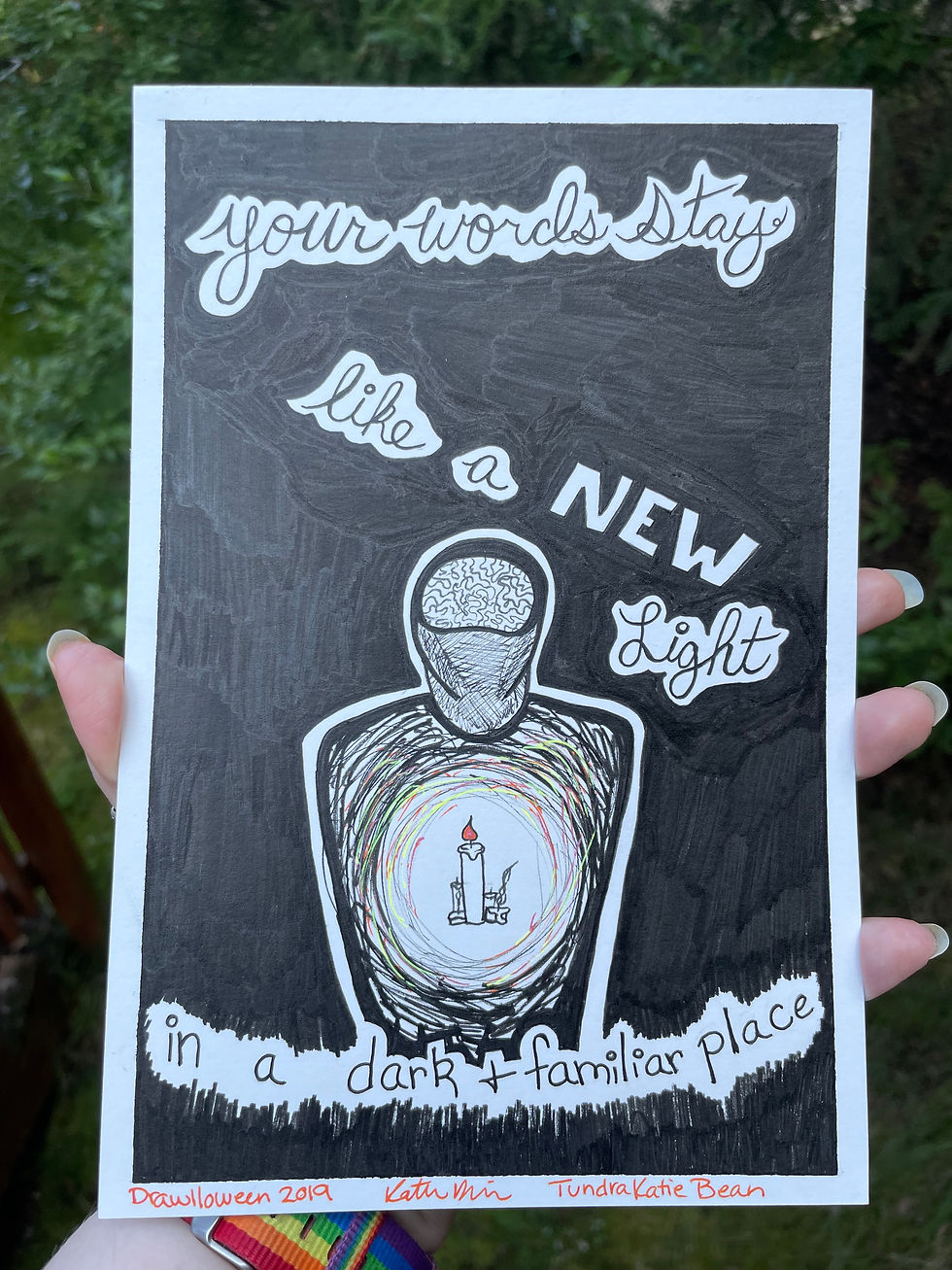 A drawing of a figure with candles in the middle of their chest and the words "you feel like a new light in a dark and familiar place"
