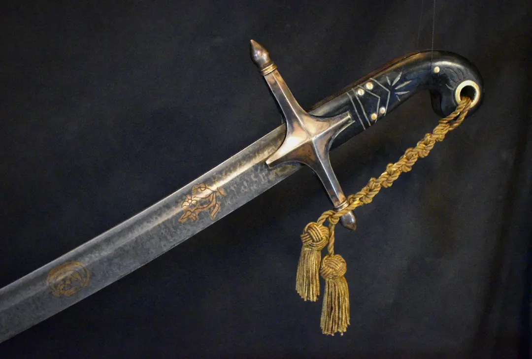 Steel, gold, horn