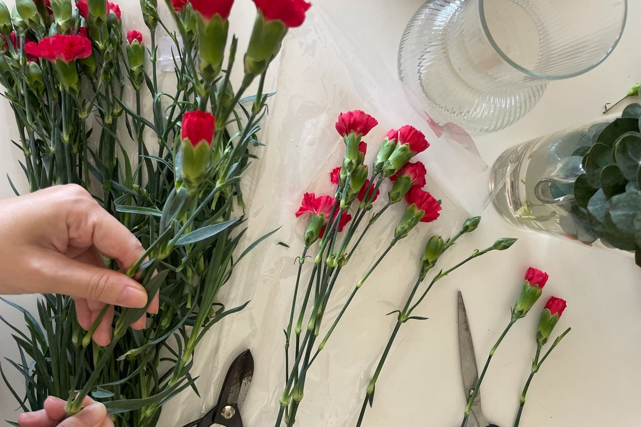 Fresh flowers and basic tools for arranging flowers at home