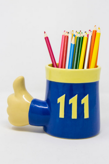 3D sculpted ceramic mug, hand painted to resemble a Vault-Tec jumpsuit from Fallout, with a 111 on the back of the mug, and a hand doing a thumbs up pose as the mug handle