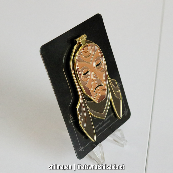 The Elder Scrolls: Skyrim Volsung Mask soft enamel pin on a matching card backing