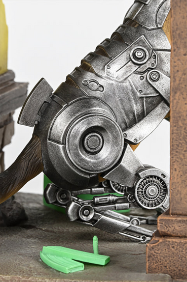 Polyresin statue of the Cyber-Hound Rex from Fallout: New Vegas. He's shown sitting inside of The King's School of Impersonation, with a matching poster up on the wall behind him, and surrounded by an ammo box, bullets, and an ammo clip that glow in the dark