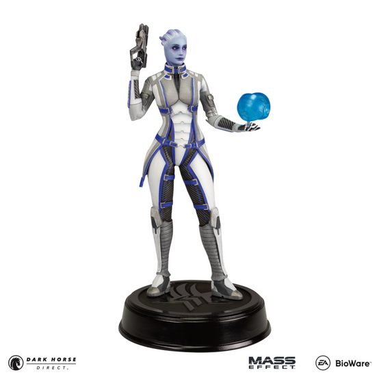 PVC figure of Liara T'Soni from Mass Effect, as seen in her Mass Effect 3 outfit, with a heavy pistol in one hand and her trusty assistant Glyph in the other, standing on top of a black base with the Paragrade (Paragon and Renegade morality symbols combined)