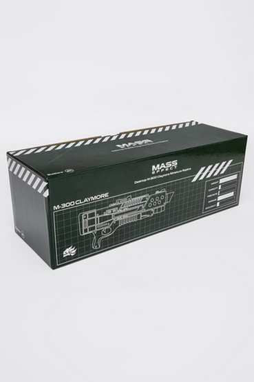 M-300 Claymore shotgun from Mass Effect desktop sized miniature replica, scaled down to 12" long or 47% of the original in-game size. It comes attached to a base with a silver color plate engraved with the Mass Effect logo and the edition number