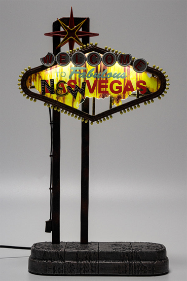 Welcome to Fabulous New Vegas small scale replica sign as seen in Fallout: New Vegas. The replica sign stands 10" tall, is back lit with hand-painted clear resin and decal, powered by USB cable
