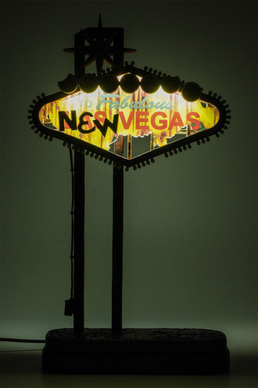 Welcome to Fabulous New Vegas small scale replica sign as seen in Fallout: New Vegas. The replica sign stands 10" tall, is back lit with hand-painted clear resin and decal, powered by USB cable