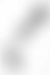 A black keychain strap that has the Vault-Tec from Fallout text and logo printed on, with a metal loop/hook that has a small Vault 101 gear door charm and matching Vault Boy charm