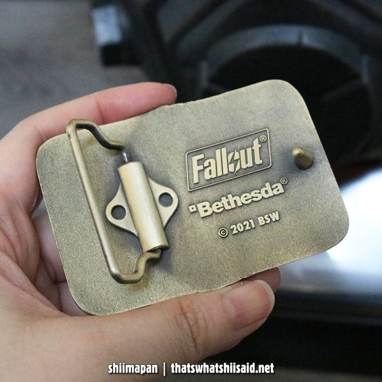 NCR Veteran Ranger Helmet Bundle by Bethesda Gear Store, the New California Republic metal belt buckle shown with Vault Boy Funko Pop! figure for scale