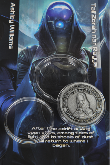 6-piece Mass Effect collector's coin album that features: Ashley Williams, Tali Zorah, Garrus Vakarian, Liara T'Soni, Urdnot Wrex, and Kaidan Alenko. Each section of the album has their respective character portraits and a memorable quote on the inside of the album, while the coins themselves feature the character's name, portrait, and quote on one side, and the Mass Effect logo on the other side