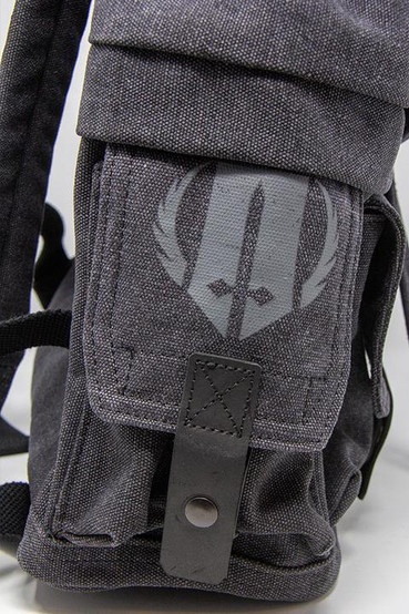 Paladin logo from Brotherhood of Steel from Fallout on the left side pouch of the backpack