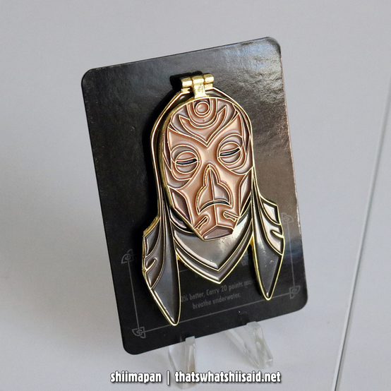 The Elder Scrolls: Skyrim Volsung Mask soft enamel pin on a matching card backing