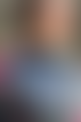 The jacket that Commander Shepard wears in Mass Effect 3, all black with dark red detail and an N7 logo embroidered over the right chest, as shown on a male and female model