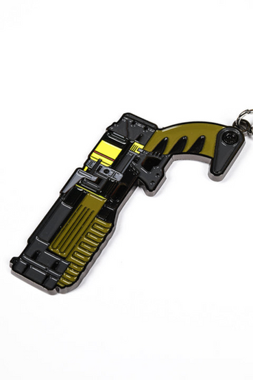 Metal keychain on a split keyring with two soft enamel charms: a Laser Pistol and Nuka-Cola bottle cap from Fallout