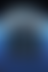 a stretched canvas art print of Tali Zorah from Mass Effect, showing her sitting on a half circle chair with her legs crossed and her hands resting on the chair seat beside her hips