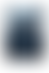 a stretched canvas art print of Tali Zorah from Mass Effect, showing her sitting on a half circle chair with her legs crossed and her hands resting on the chair seat beside her hips