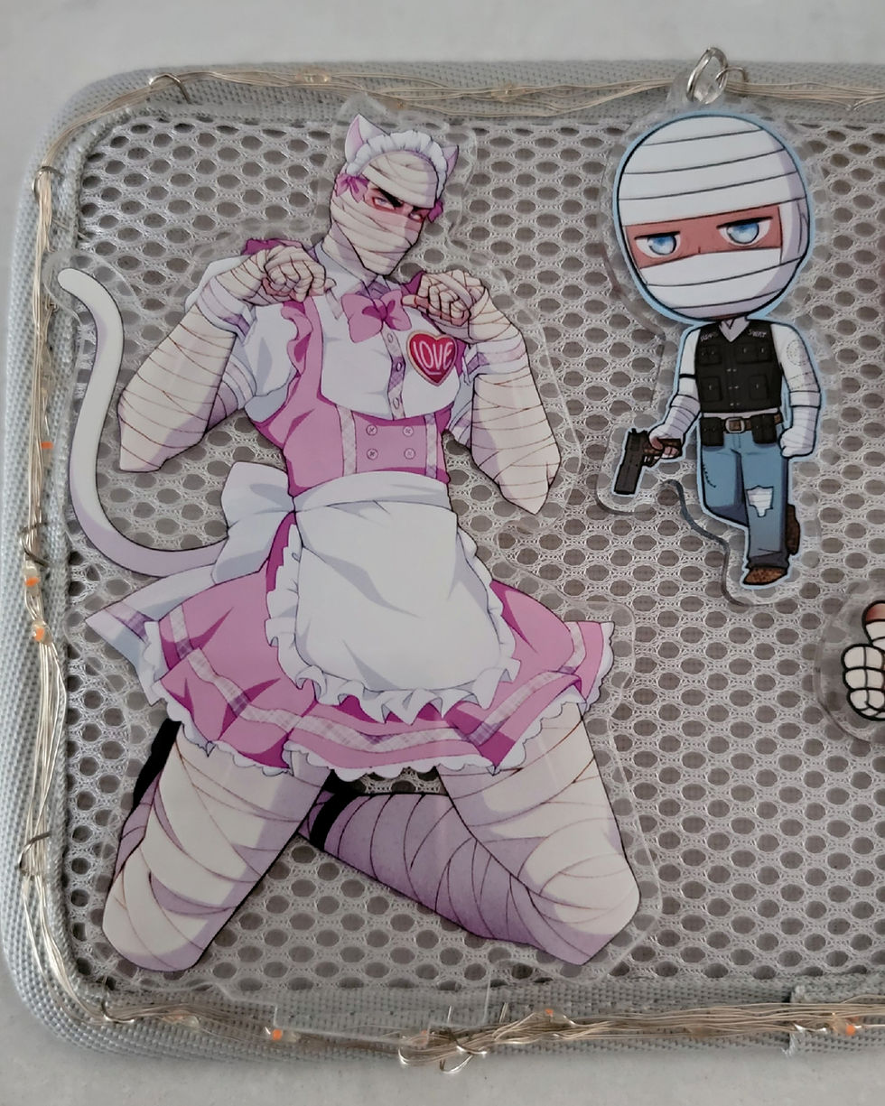 Joshua Graham from Fallout: New Vegas Honest Hearts themed ita bag, it's a holographic backpack decorated with a trading card, plush keychain, various acrylic keychains, and hot pink fairy lights