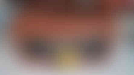 Packaging detail for the Liberty Prime Nuke Bomb bookends by Dark Horse Direct, shown with a Vault Boy Funko Pop! figure for scale