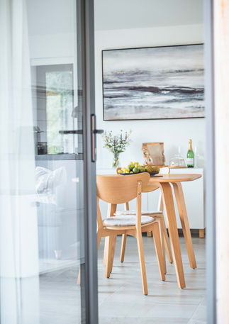 Glass door into open plan living dining kitchen