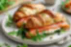 croissants-with-salted-salmon-cucumber-arugula-served-light-background-close-up.jpg