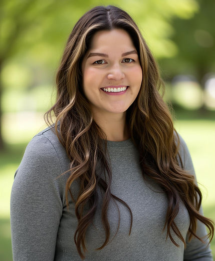 Headshot grey sweater.jpeg