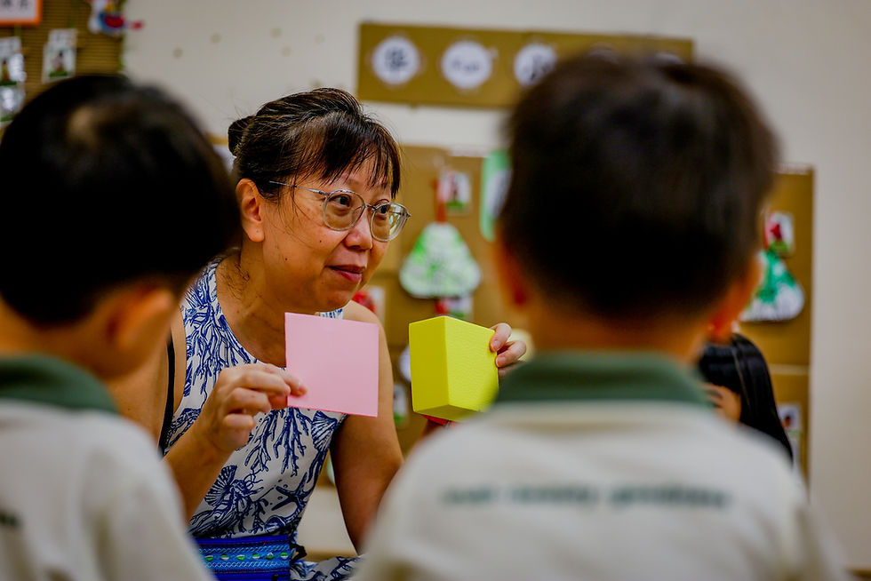 Mrs Cheng-Goh Mei Hoon Hoon teaching children about shapes and colours as part of the Key to Learning, Sensory Mathematics module offered in Little Olive Tree preschools.