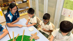 Secondary school students volunteer at Pasir Ris 21 to collaborate on Creation C.A.R.E art sculptures