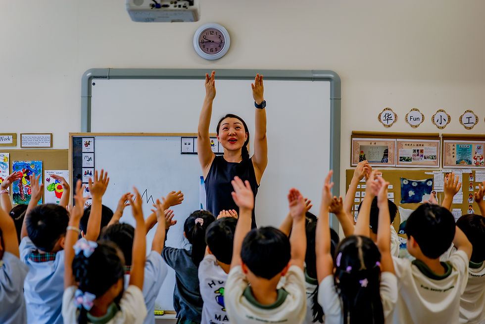 Ms Wang Su Ping leading the children in songs after a lesson on Stories from the Bible, a Chinese-language module offered by Little Olive Tree preschools, that teaches children Christian values from various stories from the Bible.