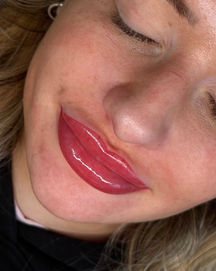Close up of bold cherry pink HD lip blush on very pale lips by PMU Parlour by Abigail Jade Warrington Cheshire