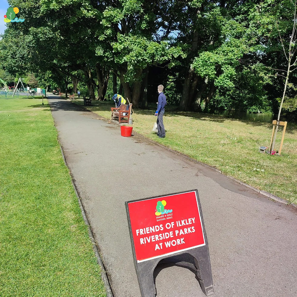 Volunteers maintaining the paths along the riverside