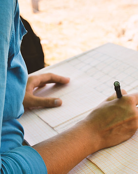 Person Writing Notes