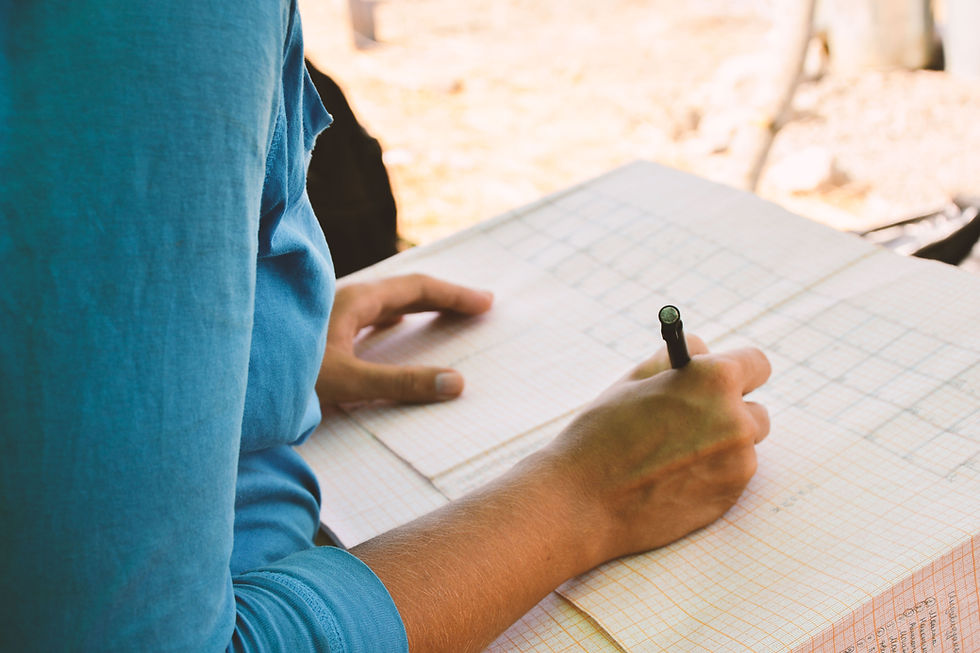 Person Writing Notes