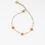 Thumbnail: Bracelet doré décoré de petites fleurs en perles Couleur au choix: Doré, Blanc, Orange, Bleu